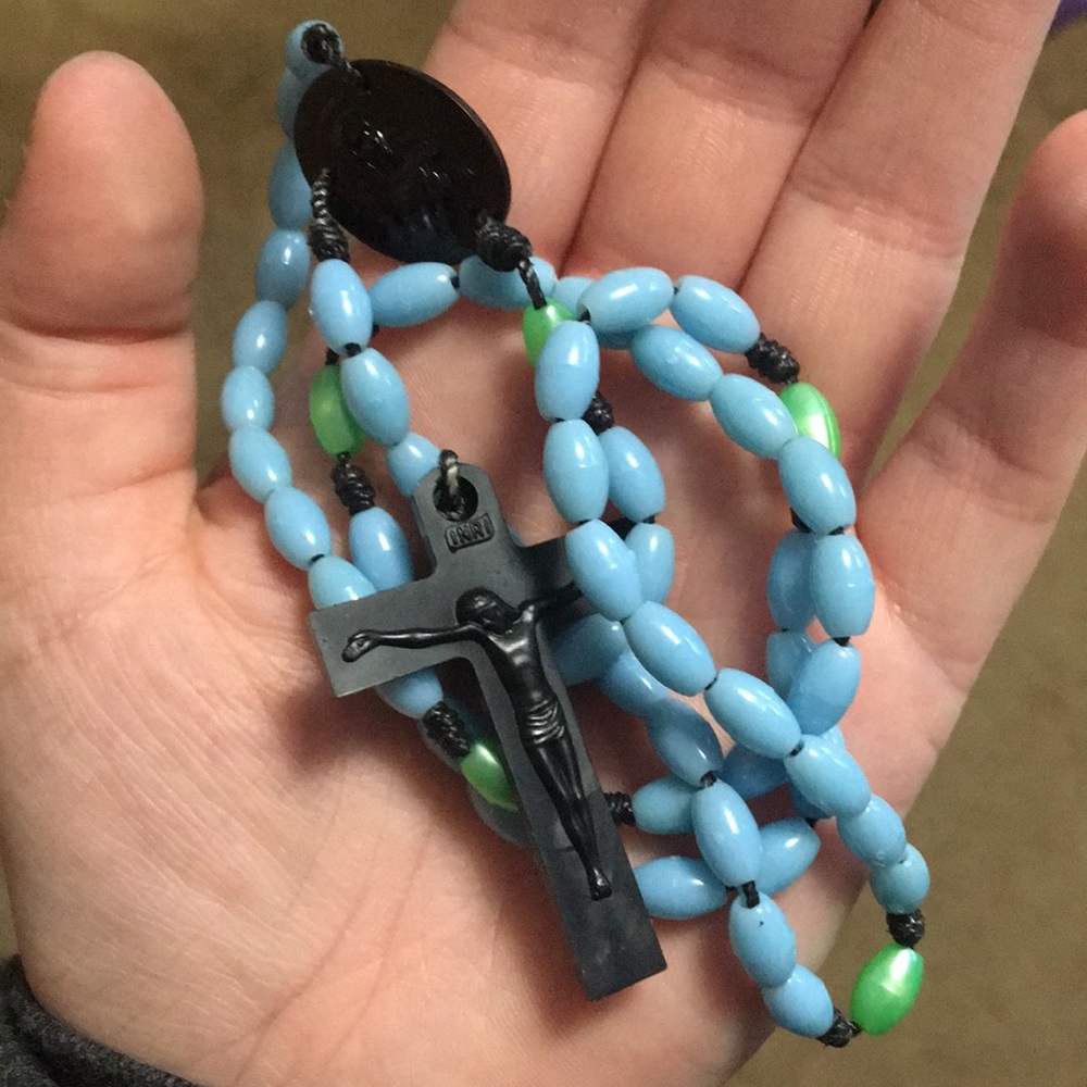 Five plastic rosaries